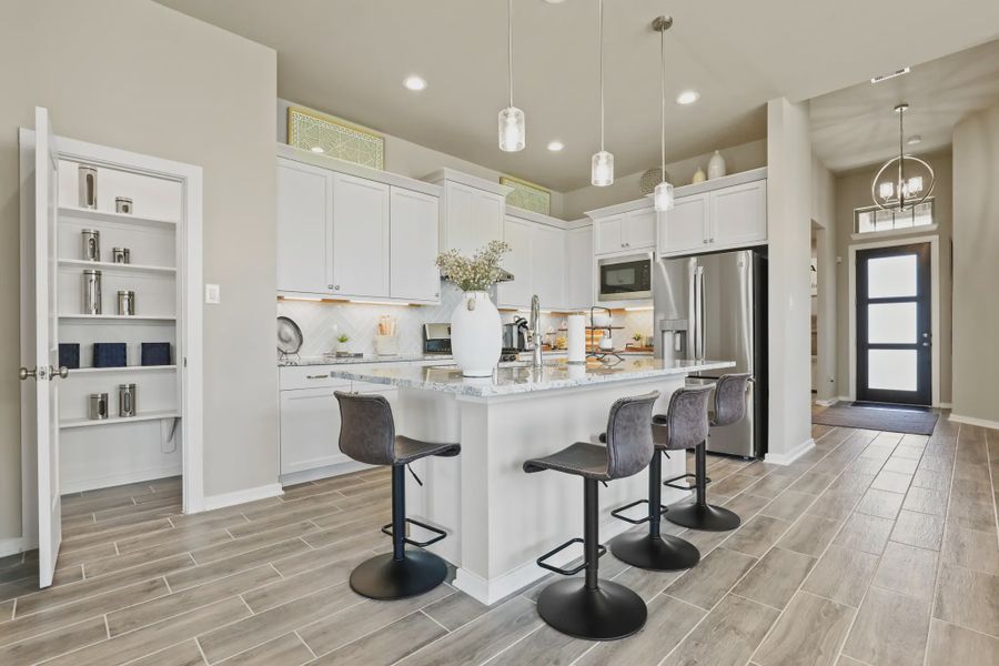 Representative furnished interior of a home built from the Oxford by Chesmar Homes in Newhaven, Manor (Image 6).