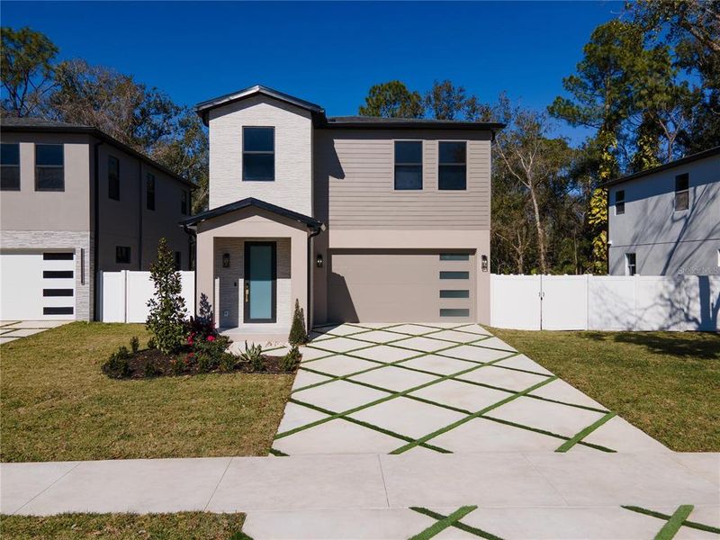Front exterior of a new home in , Tampa, FL, highlighting curb appeal (Image 31).