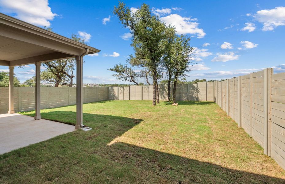 Exterior details and patio area of a home in Wolf Ranch, Georgetown (Image 3).