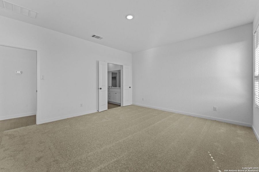 Spacious, unfurnished interior of a new home in Waterwheel: Coastline Collection, San Antonio (Image 14).