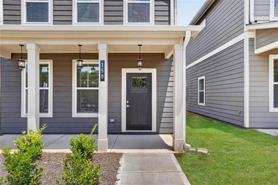 Exterior details and patio area of a home in The Cottages at East Lanier, Fayetteville (Image 3).