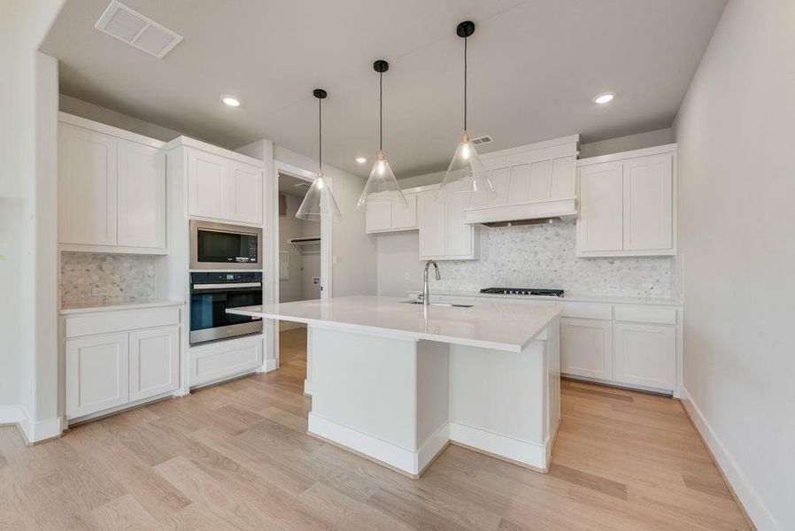 Furnished interior view inside a new home in Trails at Cottonwood Creek, Fate (Image 5).