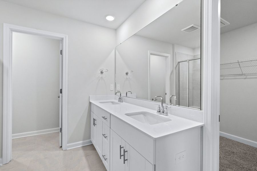 Furnished interior view inside a new home in Waterside - Coastline Series, Longs (Image 9).