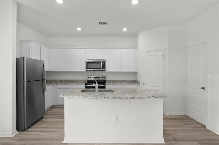 Furnished interior view inside a new home in , Astatula (Image 4).