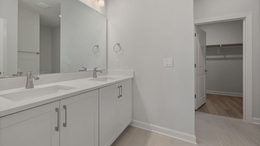 Furnished interior view inside a new home in The Courtyards at Oak Grove, Durham (Image 11).