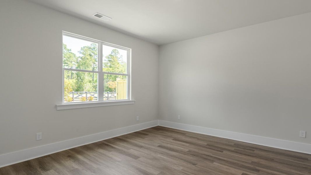 Spacious, unfurnished interior of a new home in Indigo Preserve Townhomes, Leland (Image 16).