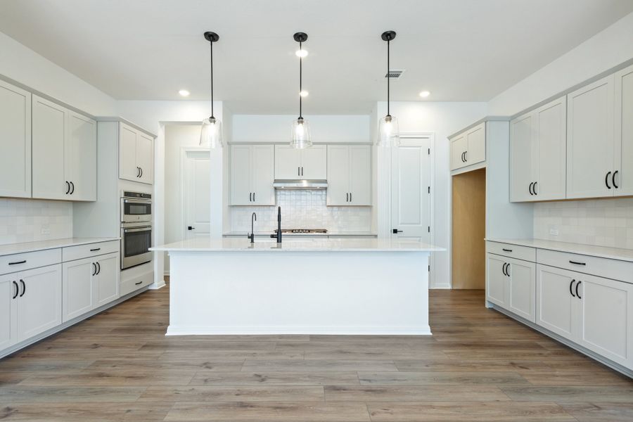 Representative furnished interior of a home built from the Waterville by Ashton Woods in The Trails at Carmel, Pflugerville (Image 15).