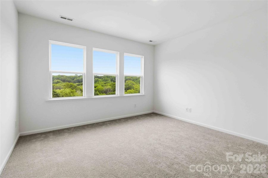 Spacious, unfurnished interior of a new home in Ridge at Sugar Creek, Indian Land (Image 25).