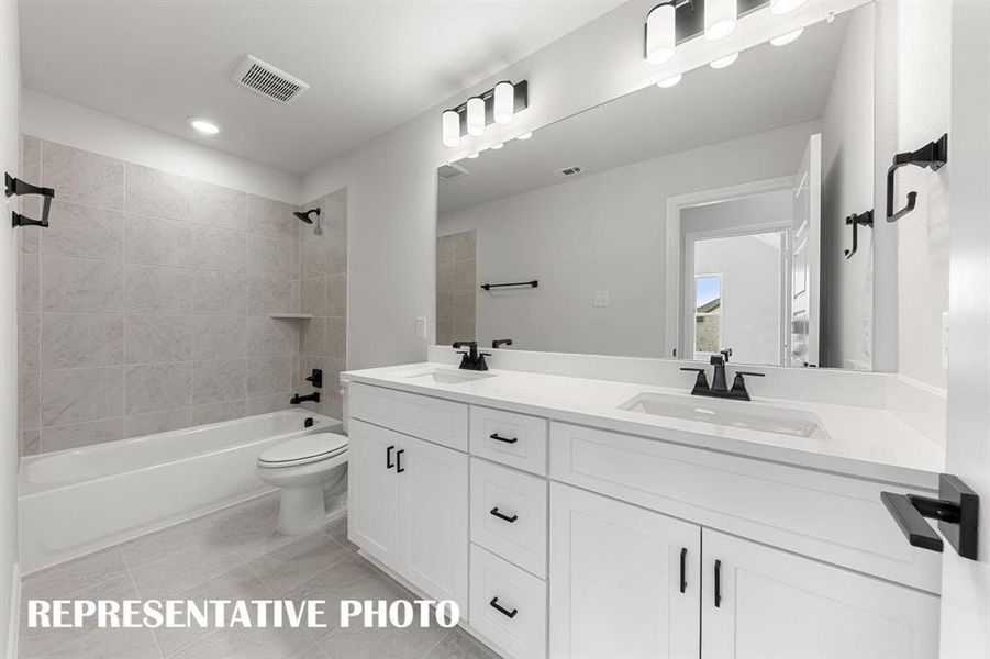 Guests will enjoy their own vanity space in this thoughtfully designed guest bath. REPRESENTATIVE PHOTO Guests will enjoy their own vanity space in this thoughtfully designed guest bath. REPRESENTATIVE PHOTO