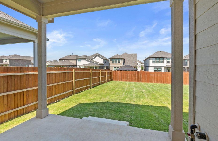 Exterior details and patio area of a home in Saddleback at Santa Rita Ranch, Liberty Hill (Image 2).