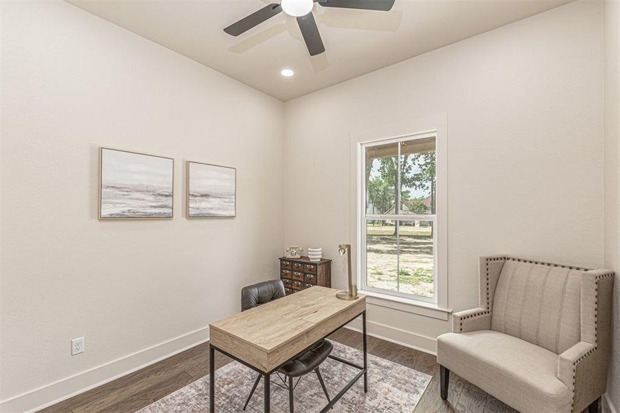 Office area with wood finished floors, a ceiling fan, and recessed lighting
