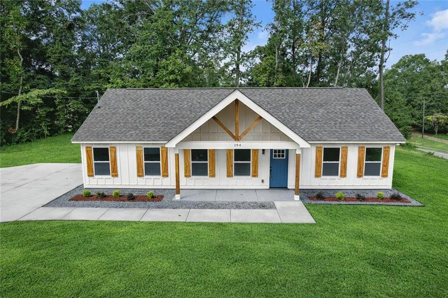 Front exterior of a new home in , Dallas, GA, highlighting curb appeal (Image 16).