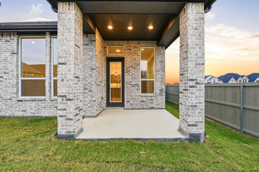 Exterior details and patio area of a home in Pecan Square: 50ft. lots, Northlake (Image 3).