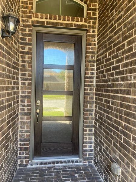 Exterior details and patio area of a home in , Euless (Image 3).