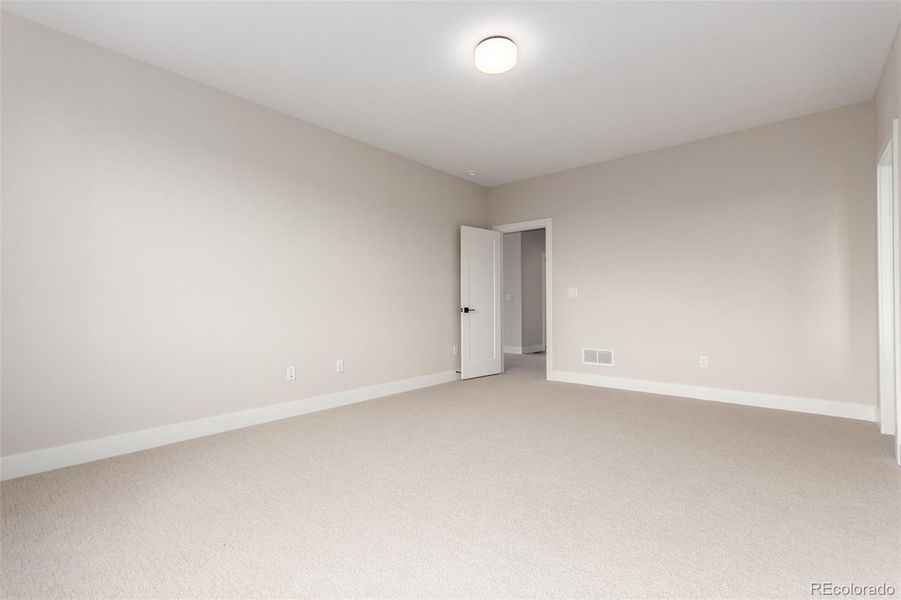 Spacious, unfurnished interior of a new home in West Grange, Longmont (Image 30).