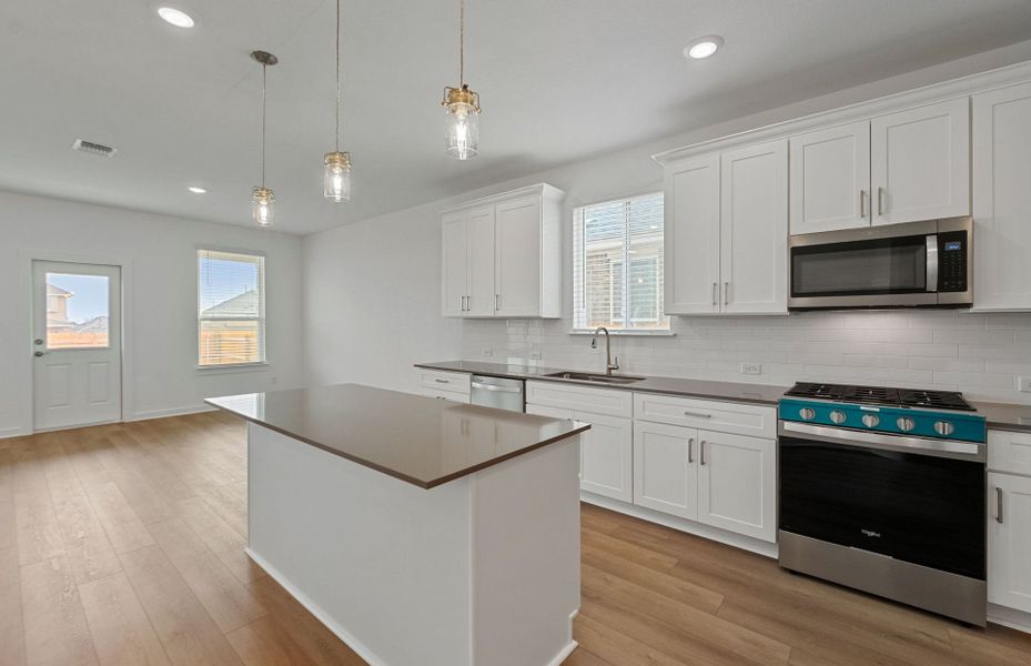 Furnished interior view inside a new home in Crosswinds, Kyle (Image 10).