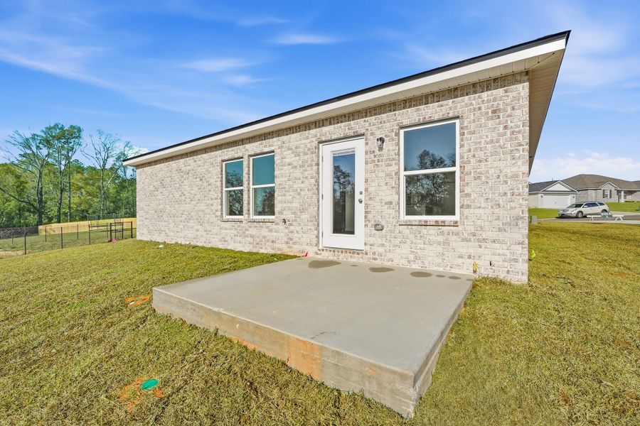 Exterior details and patio area of a home in Southern Day Chateau, Baker (Image 4).
