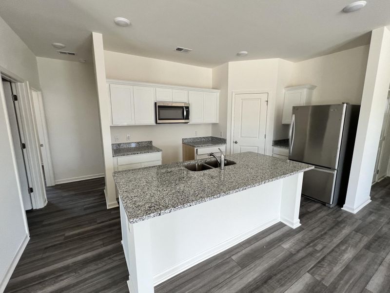 Furnished interior view inside a new home in Crossing at Givhans, Ridgeville (Image 3).