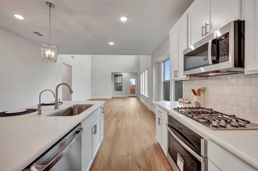 Furnished interior view inside a new home in Lilybrooke at Legacy Hills, Celina (Image 6).