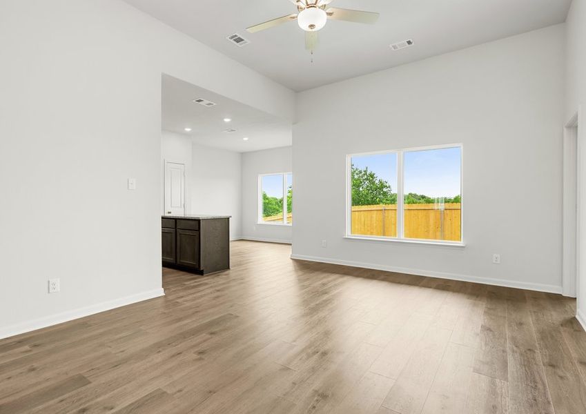 The family room has a large window that lets in great, natural light. The family room has a large window that lets in great, natural light.