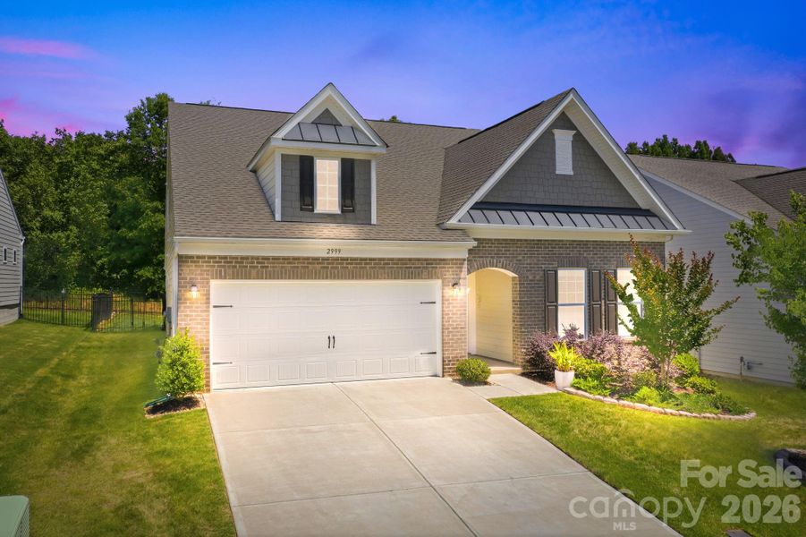 Front exterior of a new home in Bell Farm, Statesville, NC, highlighting curb appeal (Image 2). Front exterior of a new home in Bell Farm, Statesville, NC, highlighting curb appeal (Image 2).