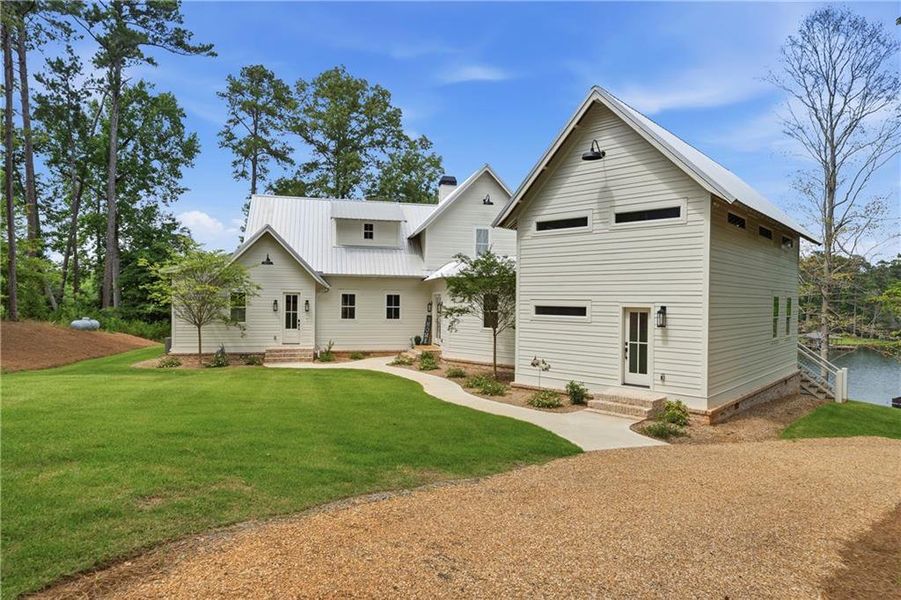 Front exterior of a new home in , Eatonton, GA, highlighting curb appeal (Image 28). Front exterior of a new home in , Eatonton, GA, highlighting curb appeal (Image 28).