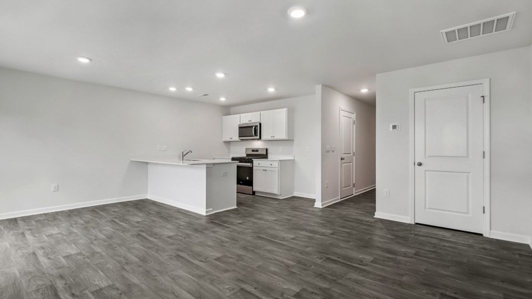Spacious, unfurnished interior of a new home in The Townes at Honeycutt Oaks, Angier (Image 14).