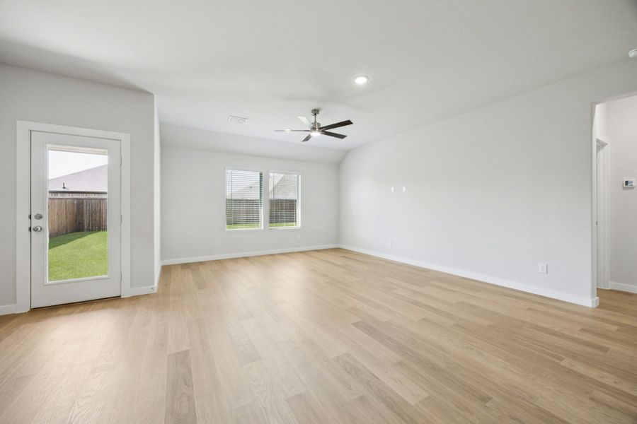 Living Room in the Heisman home plan by Trophy Signature Homes – REPRESENTATIVE PHOTO Living Room in the Heisman home plan by Trophy Signature Homes – REPRESENTATIVE PHOTO