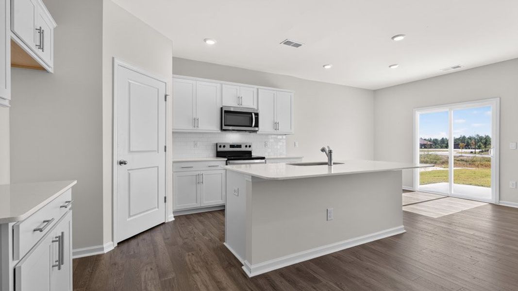 Furnished interior view inside a new home in Martin Farms, Aberdeen (Image 6).