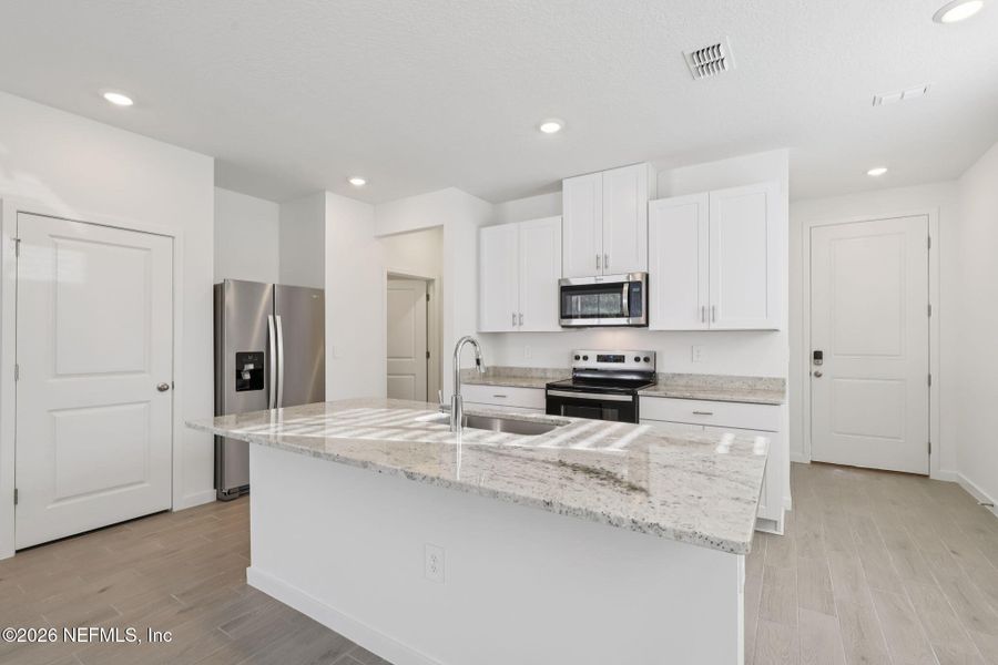 Furnished interior view inside a new home in Cypress Meadows - The Villas, Jacksonville (Image 4).