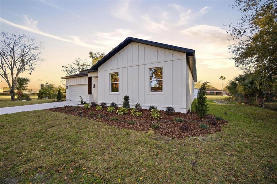Front exterior of a new home in , Plant City, FL, highlighting curb appeal (Image 21). Front exterior of a new home in , Plant City, FL, highlighting curb appeal (Image 21).