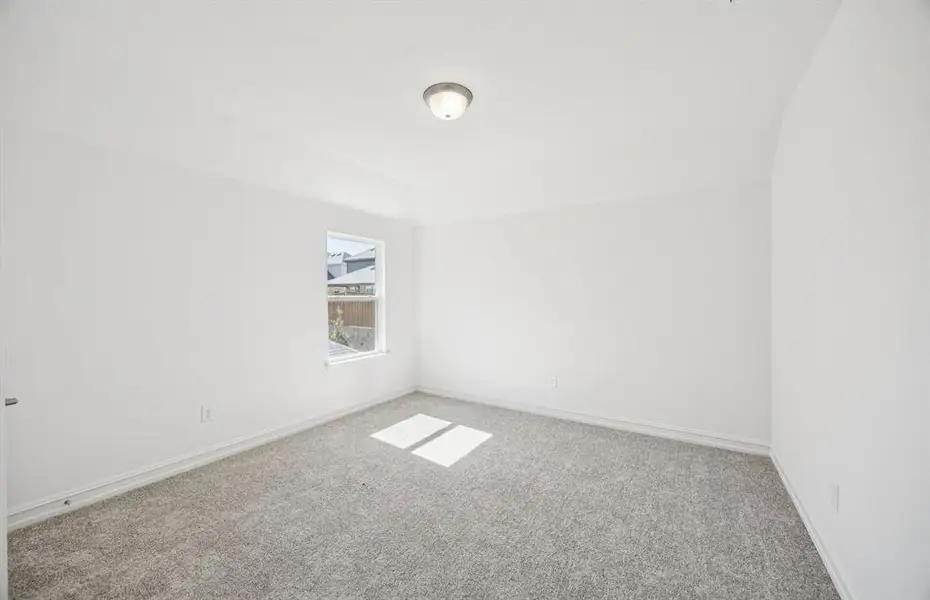 Inviting bedroom offering soft natural light Inviting bedroom offering soft natural light