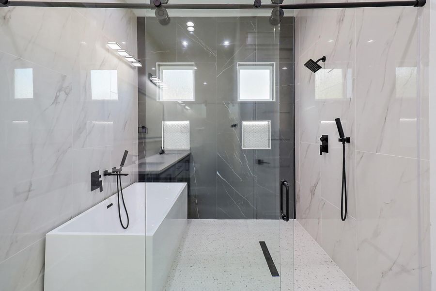 Look at this shower in this primary bathroom Look at this shower in this primary bathroom