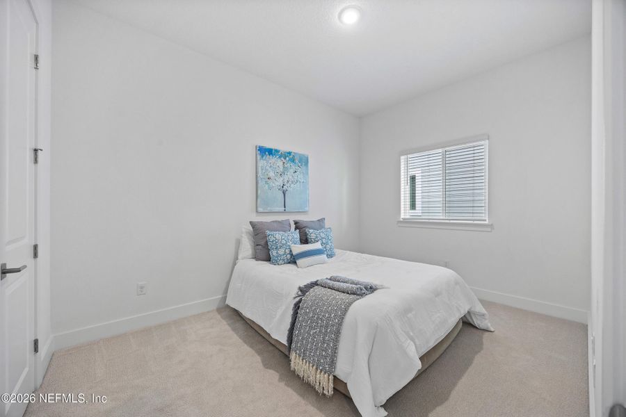 Furnished interior view inside a new home in Oak Grove at SilverLeaf 60’, St. Augustine (Image 30).