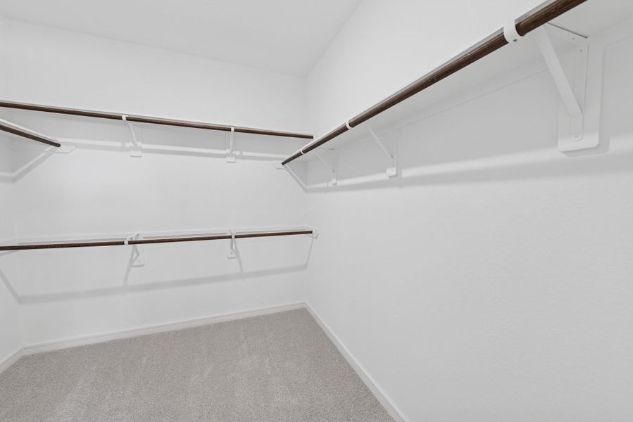 Large walk-in closet in the primary suite (*Photo not of actual home and used for illustration purposes only.) Large walk-in closet in the primary suite (*Photo not of actual home and used for illustration purposes only.)