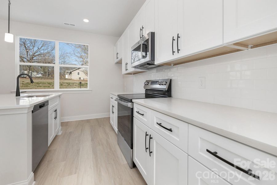 Furnished interior view inside a new home in , Statesville (Image 4).