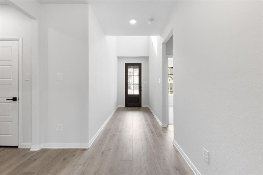 You'll love welcoming guests into your beautiful entry featuring a lovely glass and wood door, high ceilings and ample space for art work display. You'll love welcoming guests into your beautiful entry featuring a lovely glass and wood door, high ceilings and ample space for art work display.