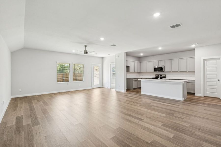 Open Floor Plan in the Oscar home plan by Trophy Signature Homes – REPRESENTATIVE PHOTO Open Floor Plan in the Oscar home plan by Trophy Signature Homes – REPRESENTATIVE PHOTO