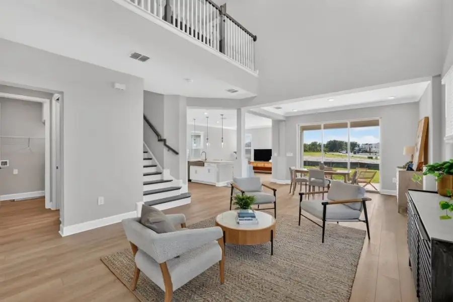 Furnished interior view inside a new home in Westview Community Group Page, Kissimmee (Image 8).