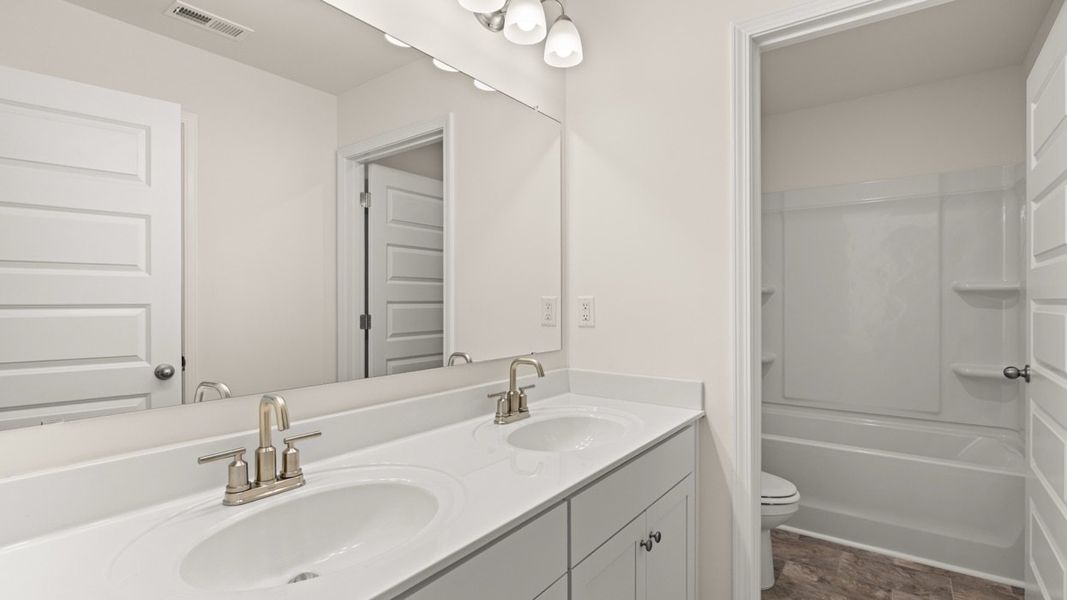 Representative furnished interior of a home built from the Hampshire by D.R. Horton in The Gates at Pates Creek, Hampton (Image 17). Representative furnished interior of a home built from the Hampshire by D.R. Horton in The Gates at Pates Creek, Hampton (Image 17).