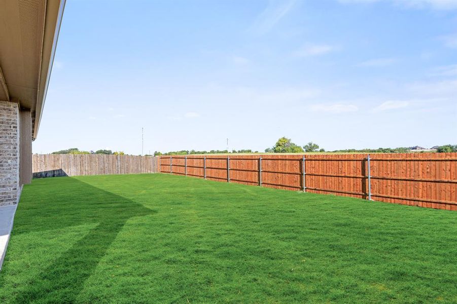 Exterior details and patio area of a home in The Grove, Midlothian (Image 2).