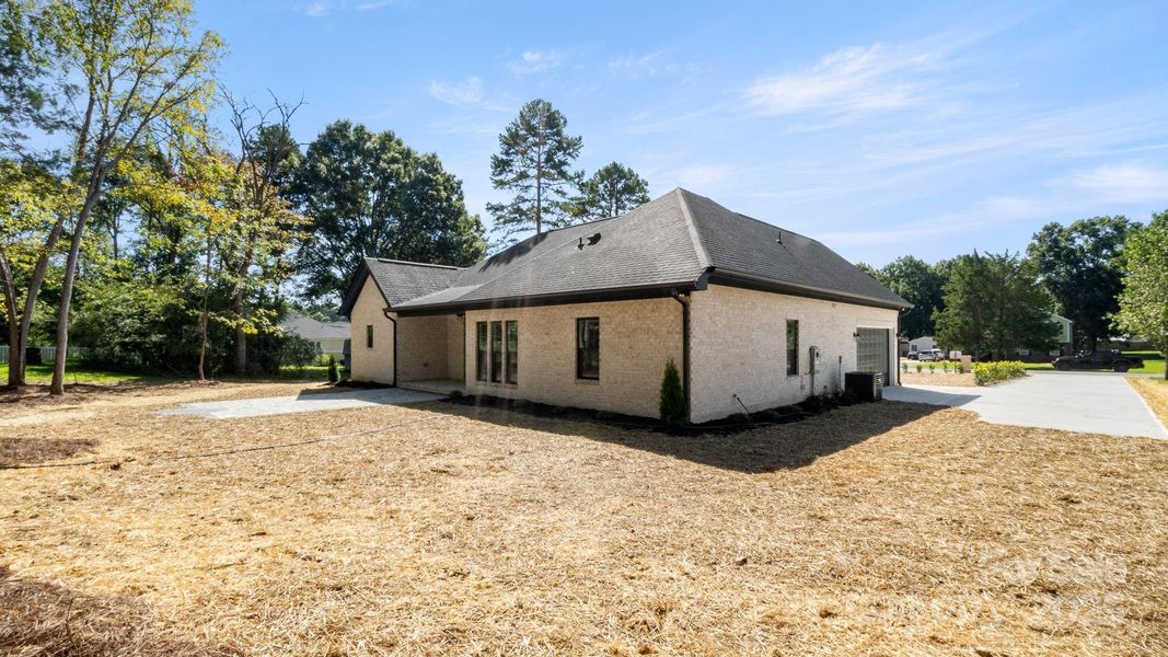 Front exterior of a new home in , Indian Trail, NC, highlighting curb appeal (Image 22). Front exterior of a new home in , Indian Trail, NC, highlighting curb appeal (Image 22).