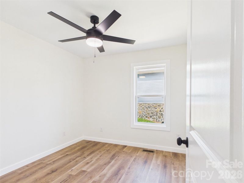 Spacious, unfurnished interior of a new home in , Valdese (Image 32).
