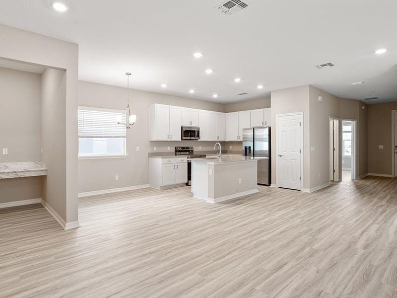 Enjoy a sunny, open living area and island kitchen. Enjoy a sunny, open living area and island kitchen.