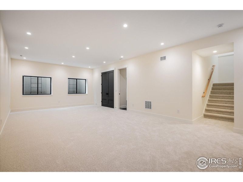 More of this well-lit, expansive basement Rec Room for all of your entertainment needs!