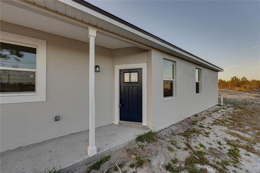 Exterior details and patio area of a home in , Indian Lake Estates (Image 15).