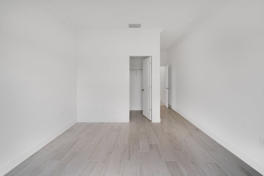 Spacious, unfurnished interior of a new home in Harvest at Ovation, Winter Garden (Image 31). Spacious, unfurnished interior of a new home in Harvest at Ovation, Winter Garden (Image 31).