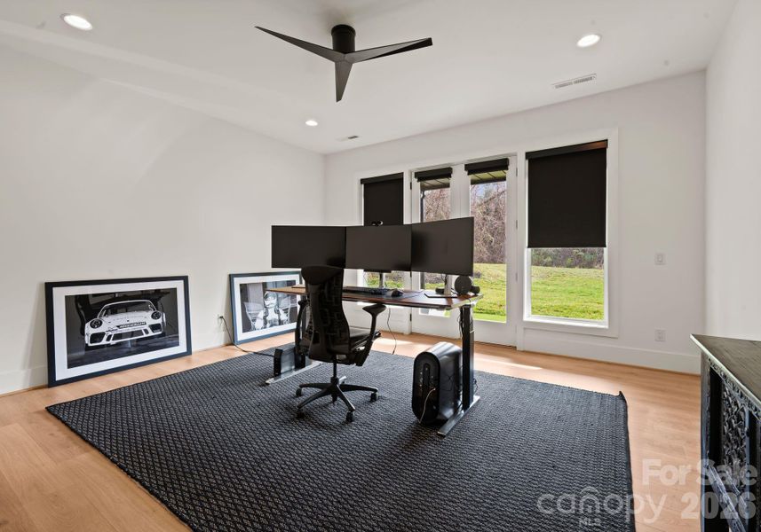 Lower bedroom/office with french doors to patio