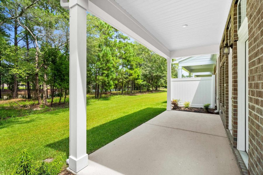 Exterior details and patio area of a home in Long Bay Golf Club, Longs (Image 23).