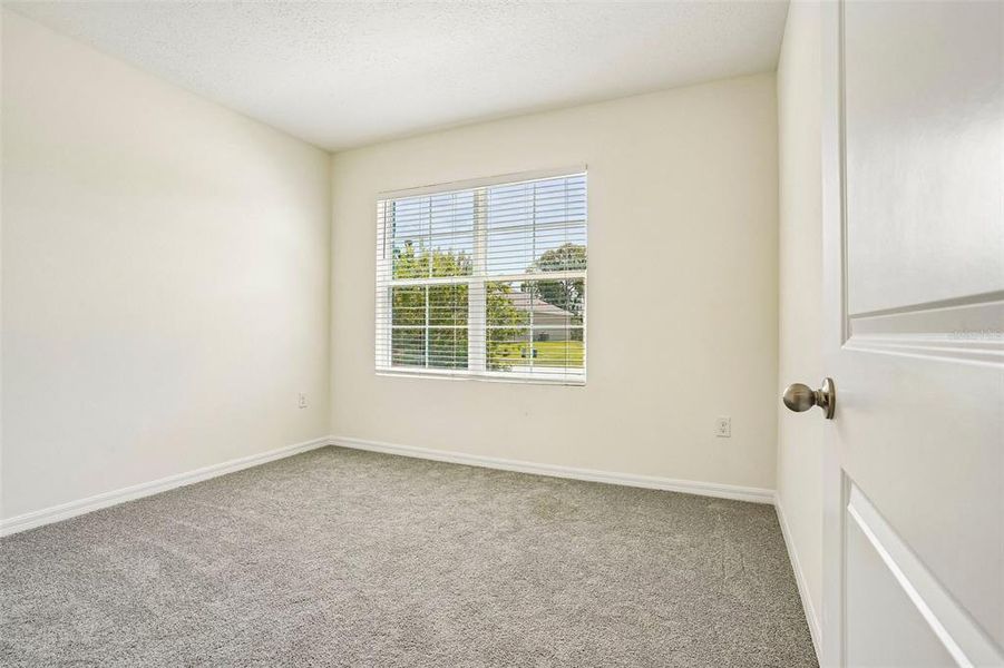 Spacious, unfurnished interior of a new home in Lake Diamond, Ocala (Image 32).